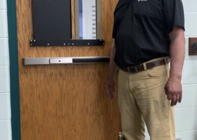 man with open window armor