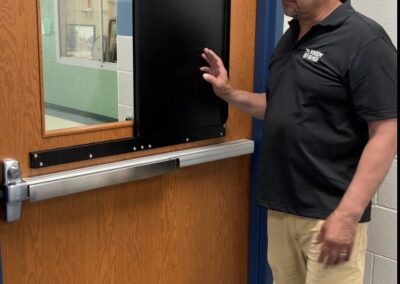 man with window armor open
