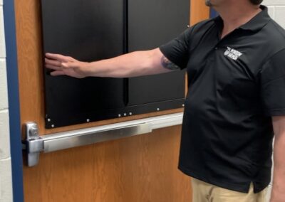 man with window armor closed